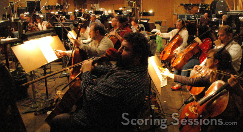 Cellist Armen Ksajikian shows his cello cozie some love