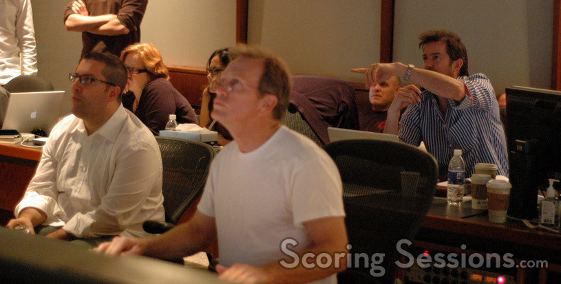 Chris Lennertz, scoring engineer Jeff Vaughn, and director Tom Dey