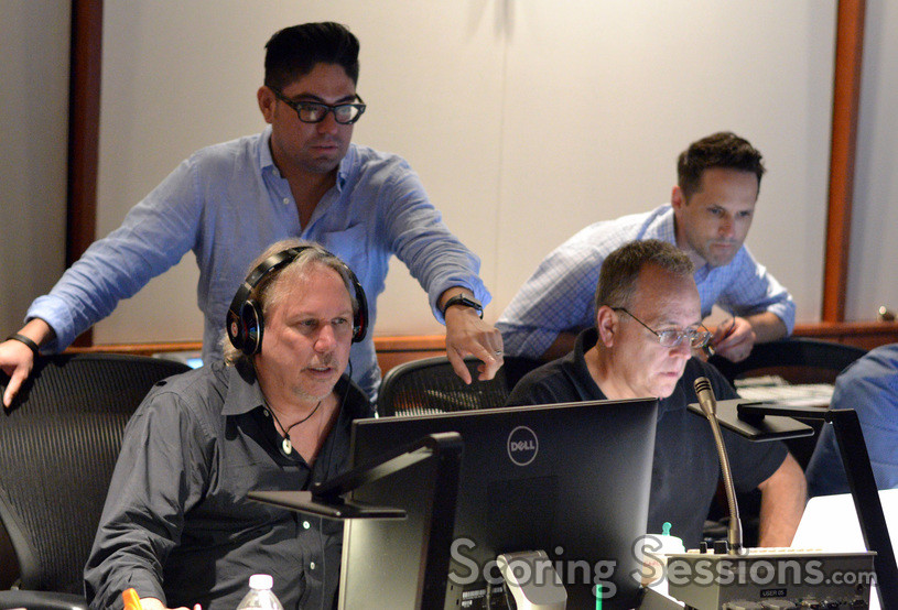 Music technical consultant Marlon Espino, composer Mark Mancina (seated, left), and music editors Earl Ghaffari and Dan Pinder