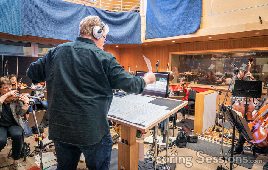 Orchestrator and conductor Pete Anthony cues the orchestra