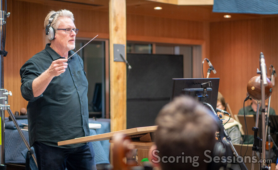 Conductor / orchestrator Pete Anthony prepares to record with the orchestra