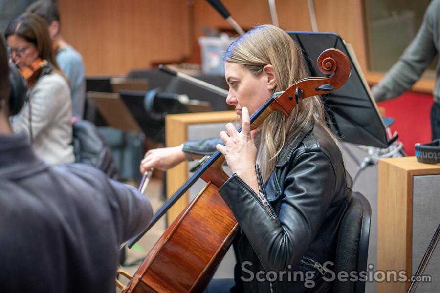 A cellist performs on A Quiet Place Part II