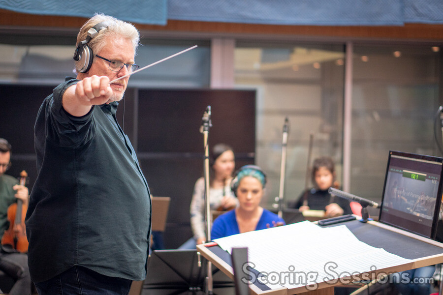Conductor / orchestrator Pete Anthony cues the celli