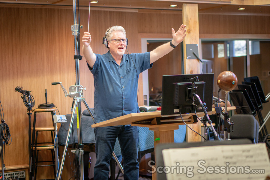 Orchestrator Pete Anthony conducts the orchestra