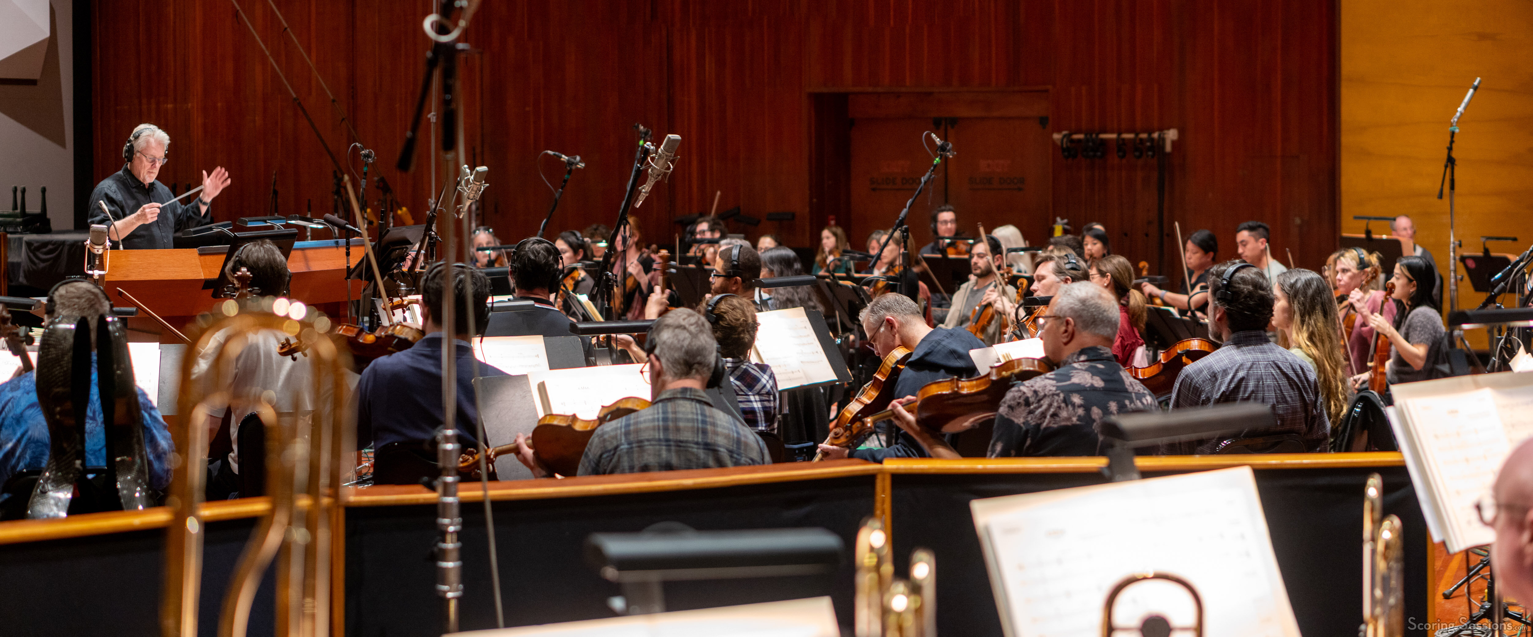 Pete Anthony conducts the musicians at Warner Bros.