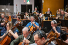 The cellos and brass